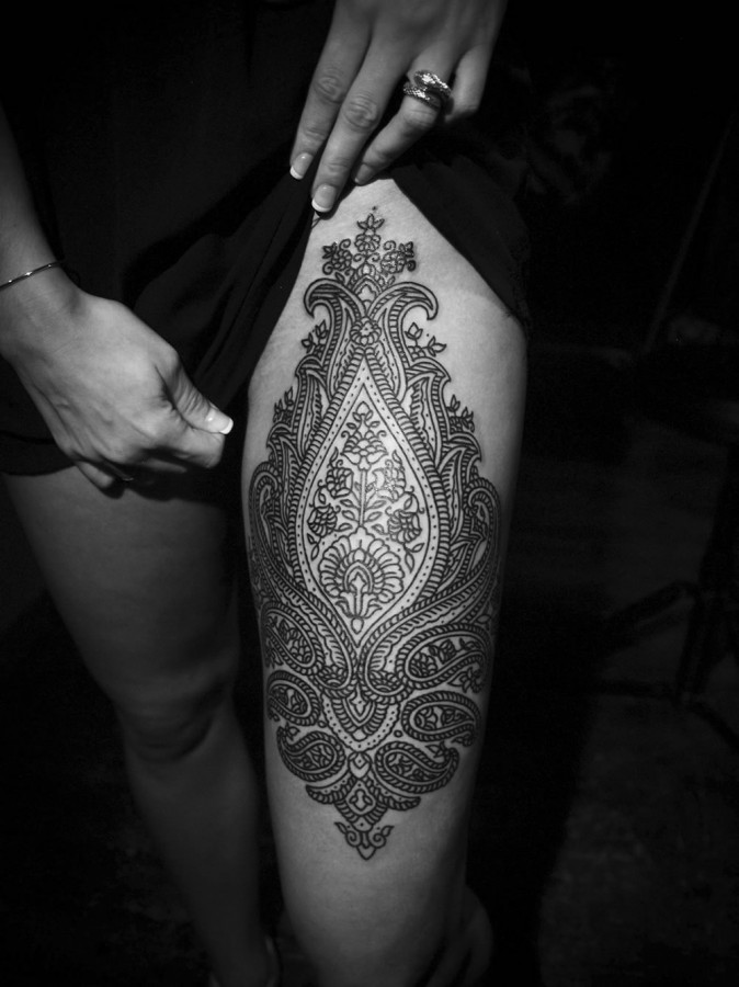 ornamental design thigh tattoo by guy le tattooer