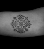 round snowflake tattoo by jean philippe burton