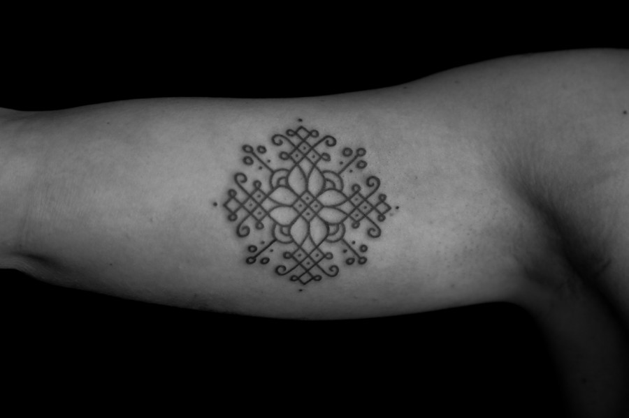 round snowflake tattoo by jean philippe burton