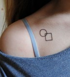 tiny geometric chest tattoo