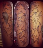 uncolored bird tattoo sleeve inspired by charley harper