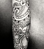 Abstract geometric arm tattoo