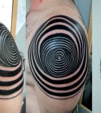 Abstract shoulder tattoo