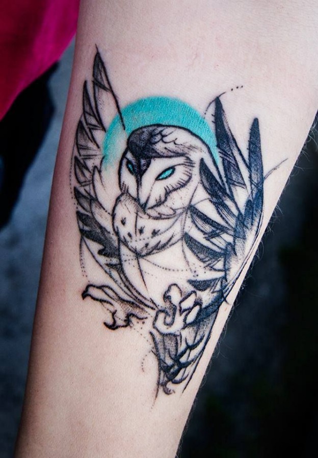 Angry owl tattoo