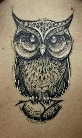 Awesome black and white owl tattoo