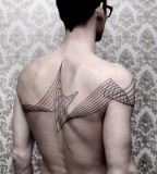 Back tattoo by Chaim Machlev