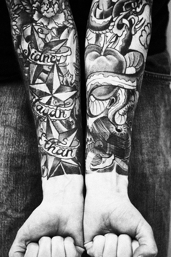 Black and whit arm tattoos