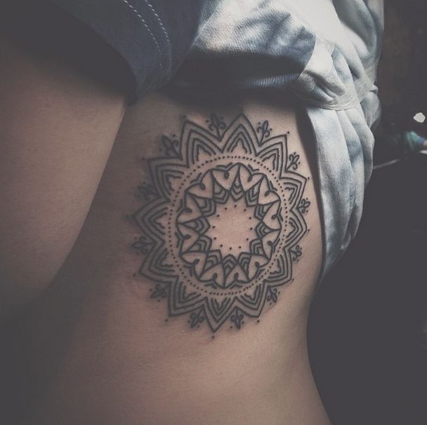 Black and white Mandala tattoo