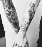 Black and white couple tattoo