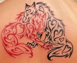 Black wold and red fox tattoos