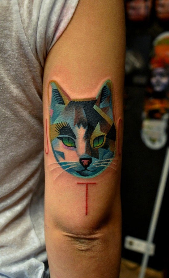 Blue cat tattoo