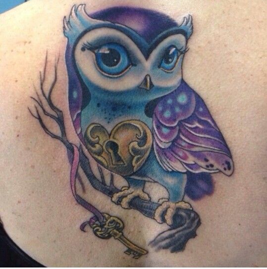Blue owl tattoo