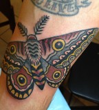 Colorful tattoos by Andy Perez butterfly