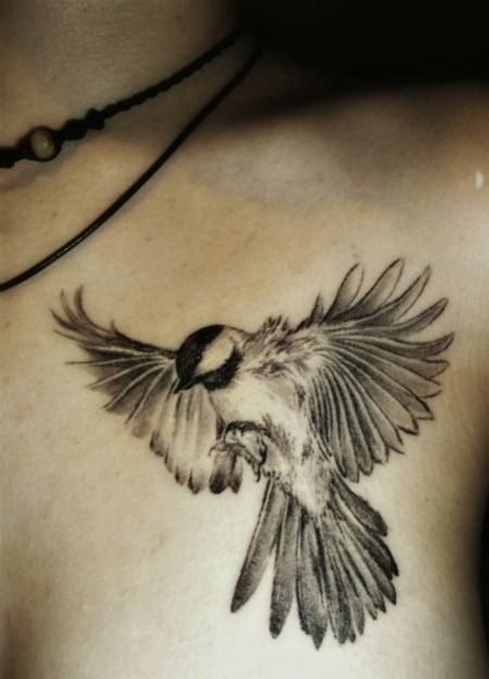 Cool  flying bird tattoo