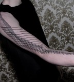Dots to lines tattoo by Chaim Machlev