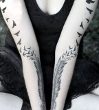 Feather bird tattoo