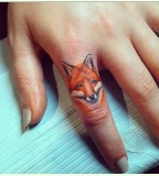 Finger fox tattoos