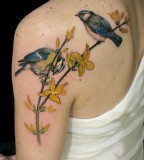 Flowers and birds tattoo