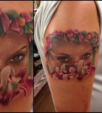 Flowers and girl tattoo by Rich Pineda