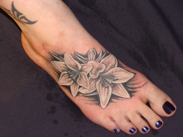 Flowers foot tattoo