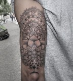 Flowers tattoo by Chaim Machlev