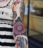 Girl and flowers tatoo on arm