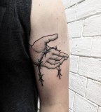 Hand tattoo by Philippe Fernandez