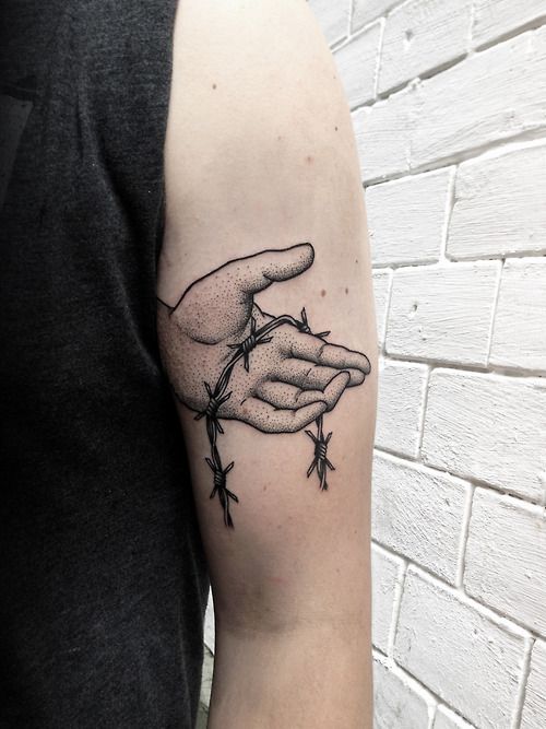 Hand tattoo by Philippe Fernandez