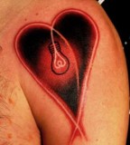 Heart and lamp tattoo by Marcin Aleksander Surowiec