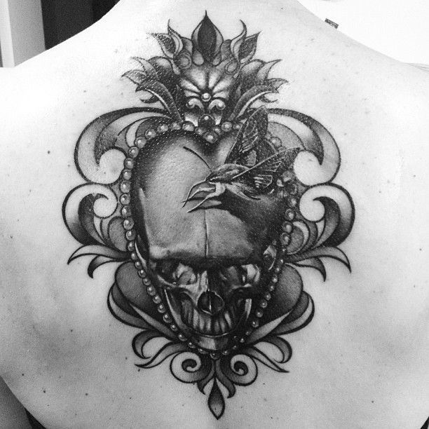 Heart and skull tattoo by Matteo Pasqualin