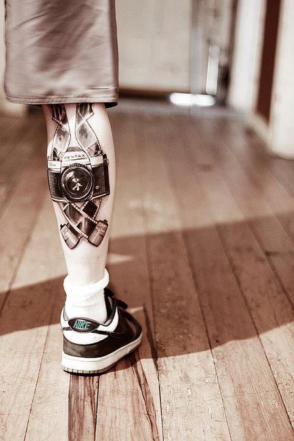 Leg camera tattoos