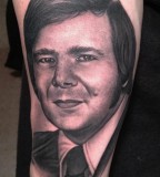 Man tattoo by Bob Tyrell