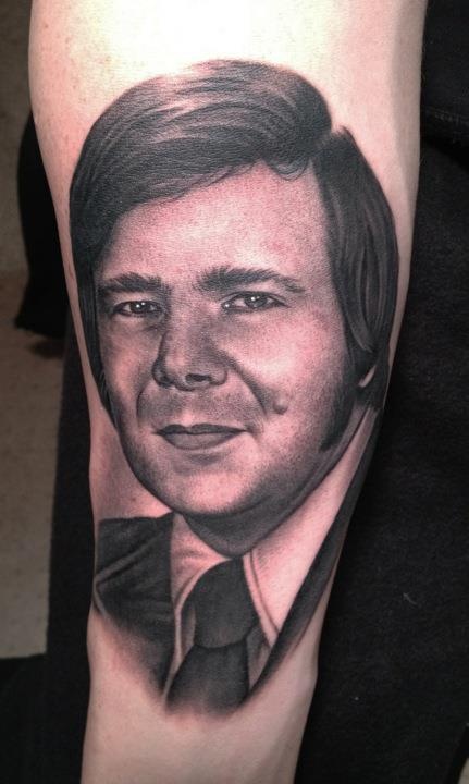 Man tattoo by Bob Tyrell