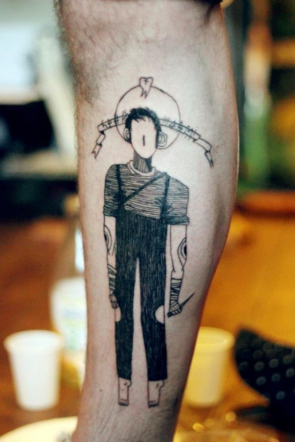 Man tattoo on leg