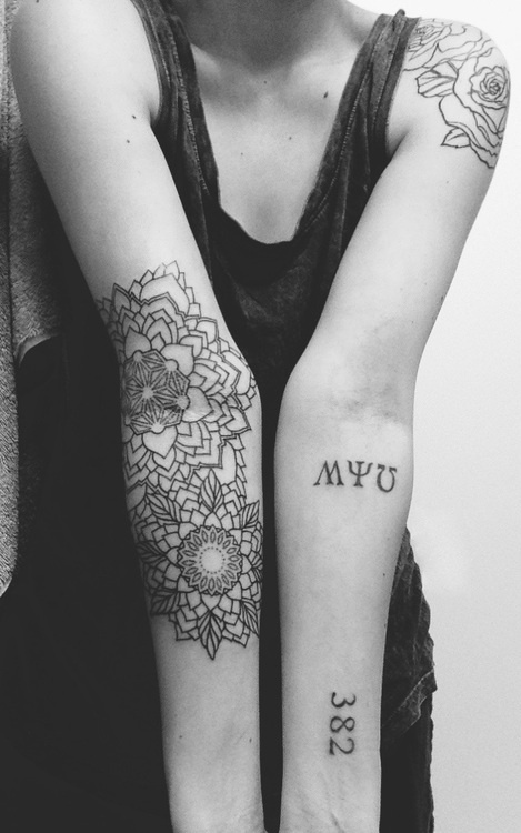 Mandala geometric flowers tattoo