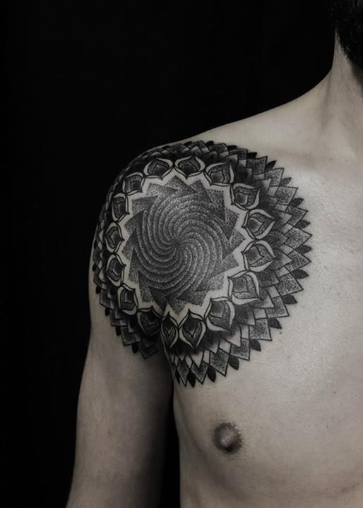Mandala tattoo on men shoulder