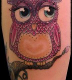 Pink owl tattoo