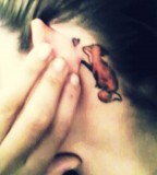 Pretty fox tattoos near ear