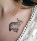 Pretty rabbit tattoo