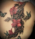 Red anf black flowers tattoo