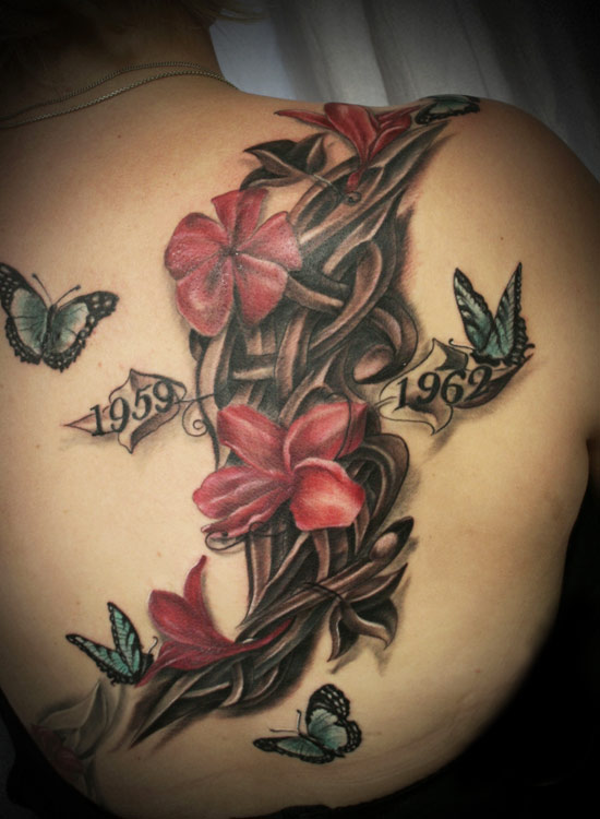 Red anf black flowers tattoo