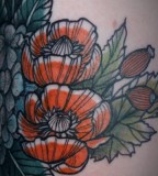 Red flowers tattoo by David Hale