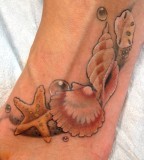 Seashell tattoo on foot