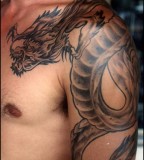 Shoulder dragon tattoo