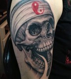 Skull tattoo by Bob Tyrell
