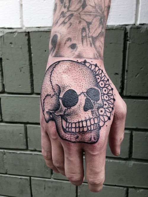 Skull tattoo by Philippe Fernandez
