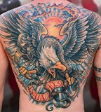 Sun and eagle tattoo