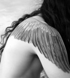 Wings shoulder tattoo