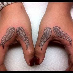 Wings tattoo on arm