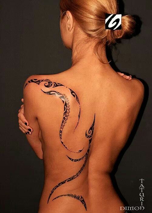 Woman pretty tattoo by Dimon Taturin